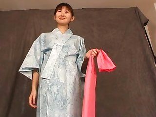 Kimono babe strips tenderly and exposes her sexy tits