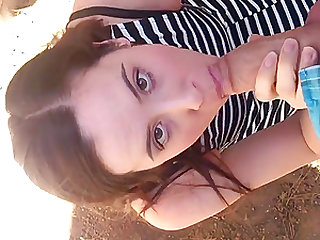 Beautiful girl gives outdoor blowjob with facial
